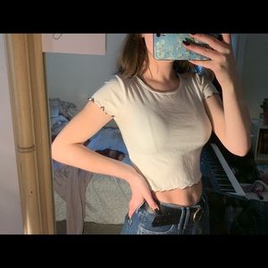 white ribbed lettuce-sleeved crop top